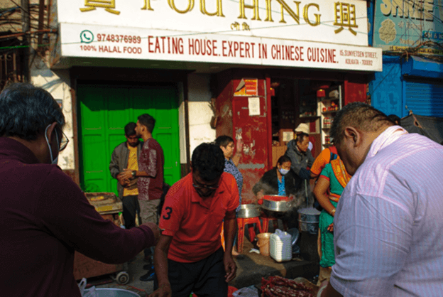 Momos in front of pou hing